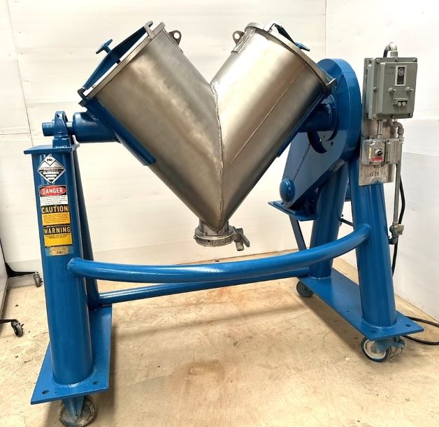 5 Cu.Ft. Patterson Kelley Twin Shell Blender, stainless steel.  Rated 95 Lbs./Cu.Ft..  3/4 HP, 208-230/460 volt, 1725 rpm Explosion Proof drive into gear reducer with 16,99: reduction. Butterfly valve discharge.  Portable on wheels. Last used in Pharmaceutic (Vitamin) plant.  Overall dims: 82